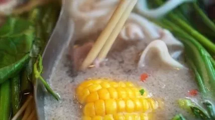 Chinese hot pot dish with corn
