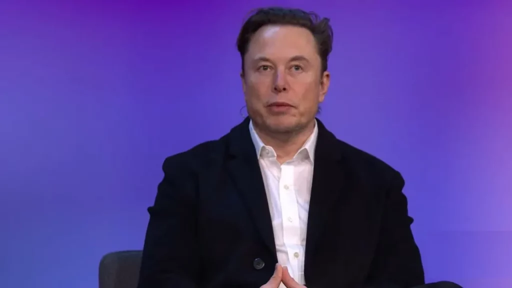 Elon Musk in black suit