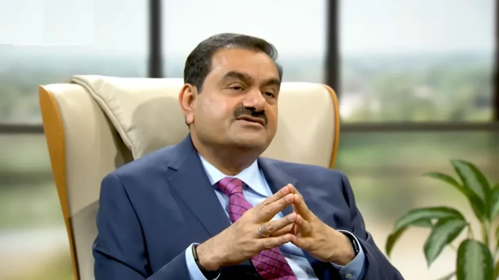 Gautam Adani in the greyish suit in a meeting and he was the second person who are in the list of top 10 richest person in the world.