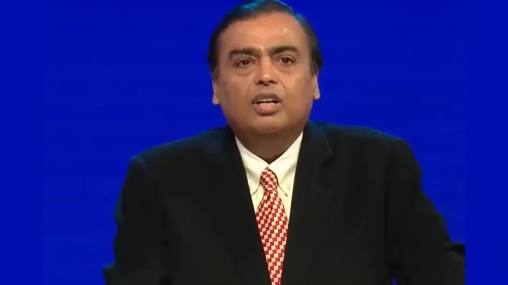 Mukesh Ambani in black suit and he was the first Indian who were in top 10 richest person in the world.