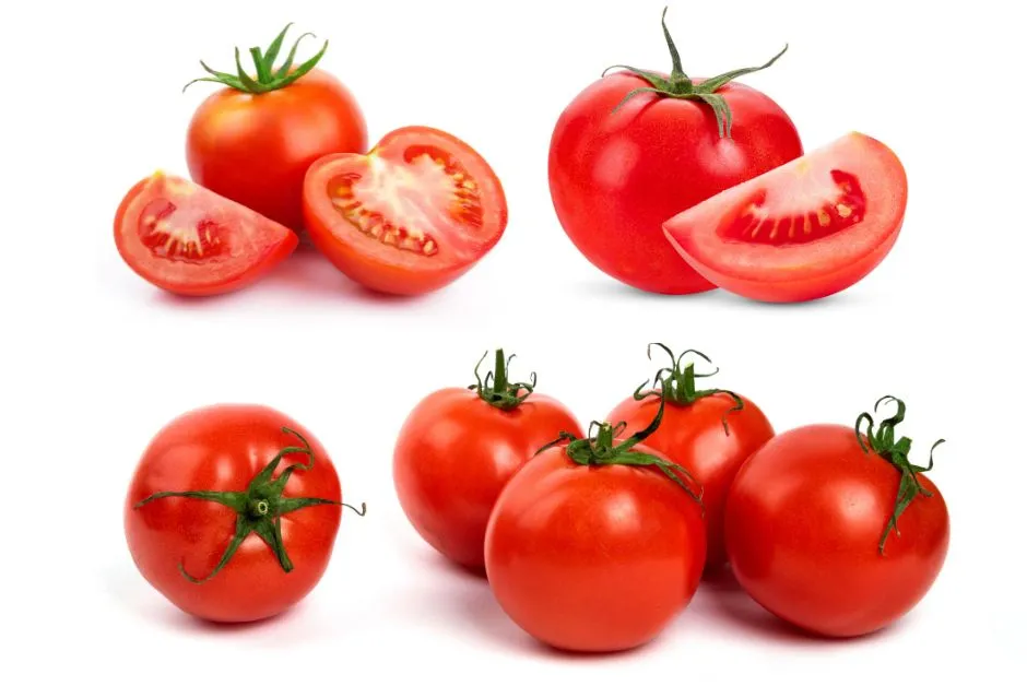 Fresh whole and sliced tomatoes rich in lycopene and vitamin C, essential vegetables in a healthy diet for glowing skin.
